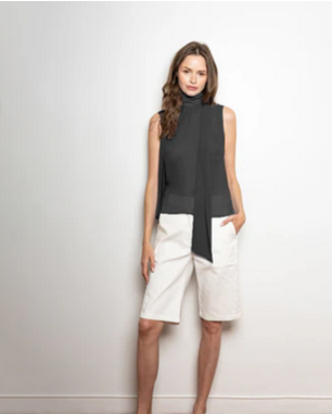 Janet Howard New York Kensington Blouse Black styled with white shorts – chic modern minimalist outfit