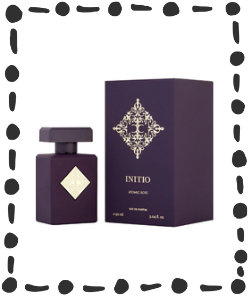 Initio Parfums Privés Atomic Rose perfume bottle and box in deep purple packaging, displayed on a white background.